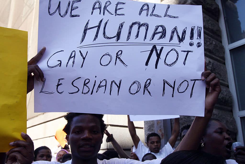 South African human rights activists protest protest against homosexuals imprisoned in Malawi. 